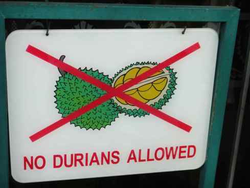 Sign with crossed picture of durian fruit and text No Durians Allowed, Penang, Malaysia